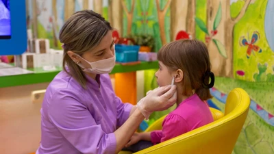 Прокол мочек ушей по "Системе 75" в детской парикмахерской "Островок детства"