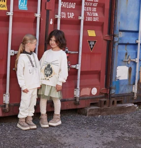 Подарочный сертификат от 1000 рублей в магазин детской одежды "Button Blue"